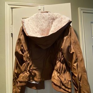 Tan faux leather soft jacket with faux fur lining